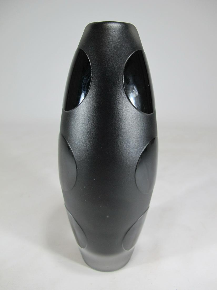 Orrefors, Sweden black amethyst glass vase: Orrefors, Sweden black amethyst glass vase. 8 3/4” H x 3 1/4” W. Shipping in USA or International please contact for quote both UPS stores: 1) : David Reiser UPS store 1937 - 954-454-1131 