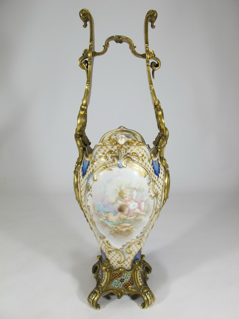 Antique Sevres bronze champleve vase, signed: Antique Sevres bronze champleve vase, signed. 14 3/8” H x 4 3/4” W x 4 3/8” D. Shipping in USA or International please contact for quote both UPS stores: 1) : David Reiser UPS store