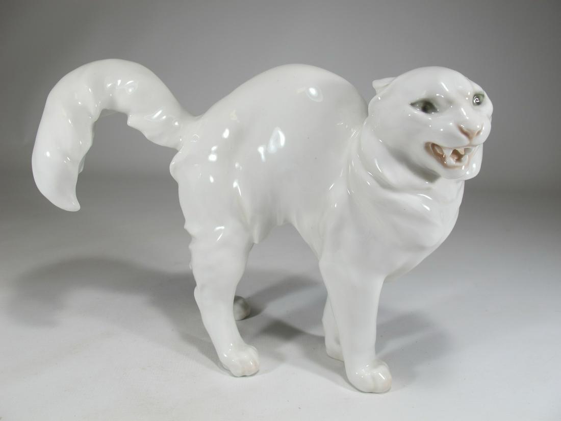 B & G Copenhagen white porcelain cat statue: B & G Copenhagen white porcelain cat statue. Bing & Grøndahl was a Danish porcelain manufacturer founded in 1853 by the sculptor Frederik Vilhelm Grøndahl and merchant brothers Meyer Hermann Bing an