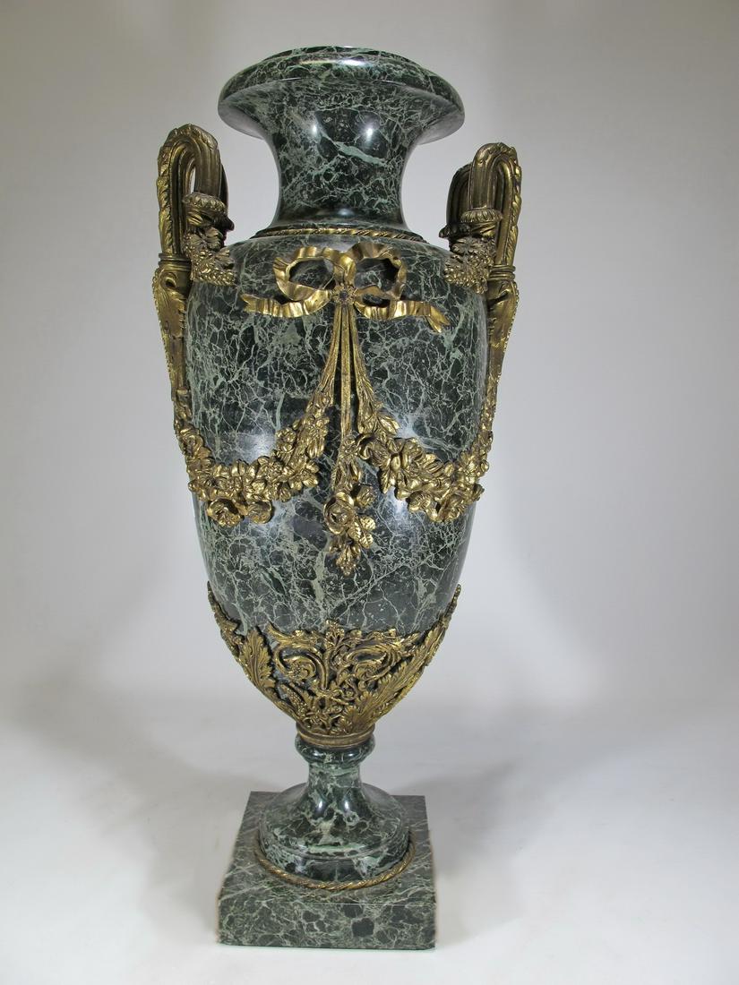 Large marble ormolu bronze urn: Large marble ormolu bronze urn. 26 1/2 in H x 10 3/4 in W x 9 1/2 in D. Shipping in USA or International please contact for quote both UPS stores: 1) : David Reiser UPS store 1937 - 954-454-1131 aucti