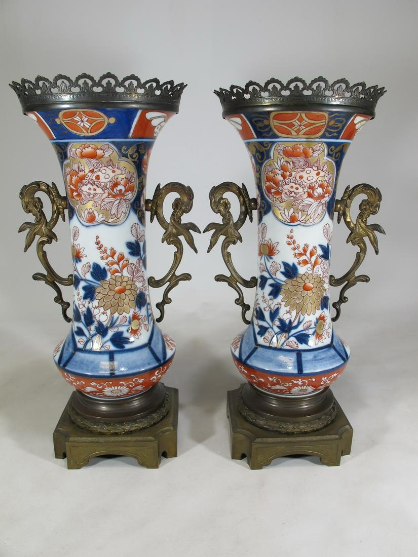 Antique Japanese Imari pair of bronze & porcelain vases: Antique Japanese Imari pair of bronze & porcelain vases. 13 1/2” H x 6 1/2” W x 6” D. Shipping in USA or International please contact for quote both UPS stores: 1) : David Reiser UPS