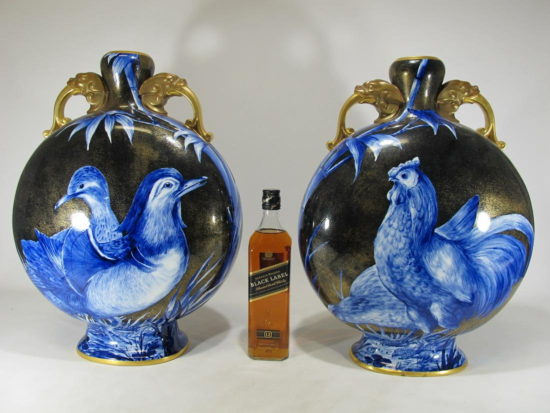 Royal Worcester Moon large pair of porcelain vases: Royal Worcester Moon large pair of porcelain vases by James Bradley. 20” H x 14 1/2” W x 6” D. Shipping in USA or International please contact for quote both UPS stores: 1) : David R