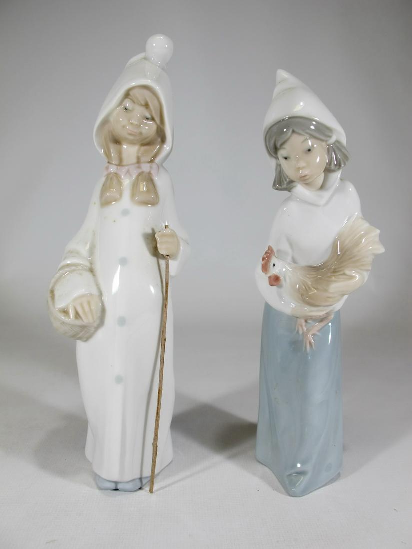 2 Lladro porcelain statues: 2 Lladro porcelain statues. 8 1/4” H x 2 1/4” W and 7 7/8” H x 2 1/4” W. Shipping in USA or International please contact for quote both UPS stores: 1) : David Reiser UPS store 