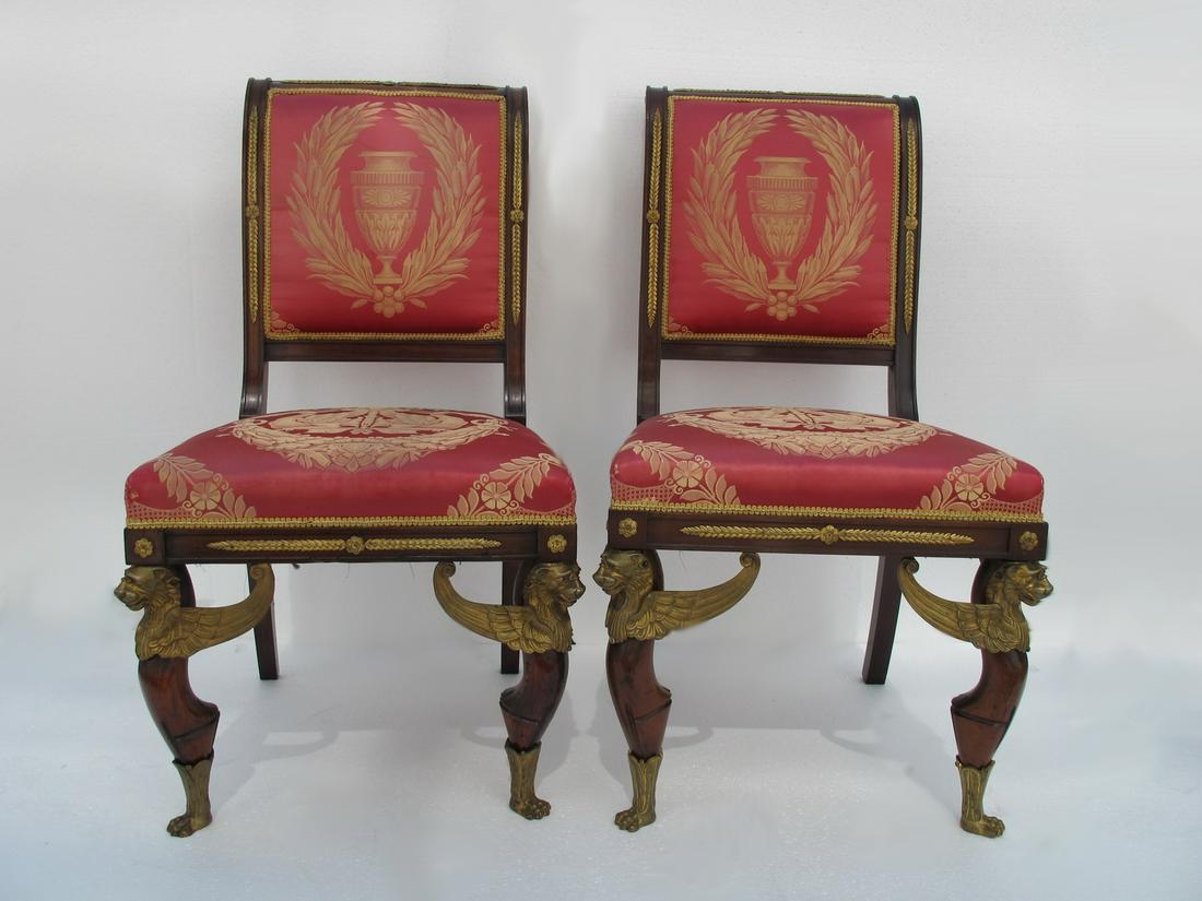 Pair of French ormolu mounted mahogany chairs: Pair of French ormolu mounted mahogany chairs. 38” H x 21” W x 23 1/2” D. Shipping in USA or International please contact for quote both UPS stores: 1) : David Reiser UPS store 1937 - 954-454-11