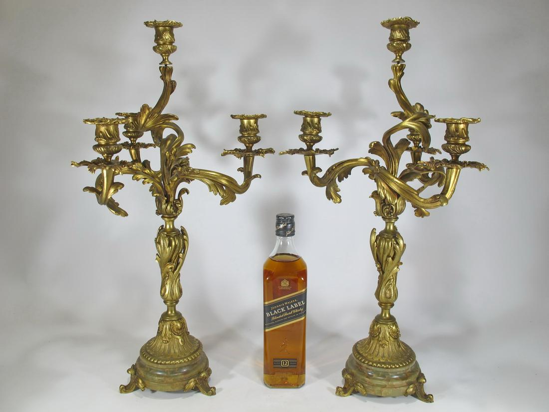 Antique French pair of bronze dore 4 lights candelabras: Antique French pair of bronze dore 4 lights candelabras. 22 3/4” H x 11 1/2” W. Shipping in USA or International please contact for quote both UPS stores: 1) : David Reiser UPS store 1937 