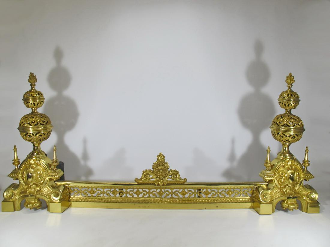 Antique French gilt bronze 3 pcs fireplace set: Antique French gilt bronze 3 pcs fireplace set. Andirons: 21” H x 10” W x 2 1/4” D. Front: 9” H x 35 1/2” W x 1 1/2” D. Shipping in USA or International please cont