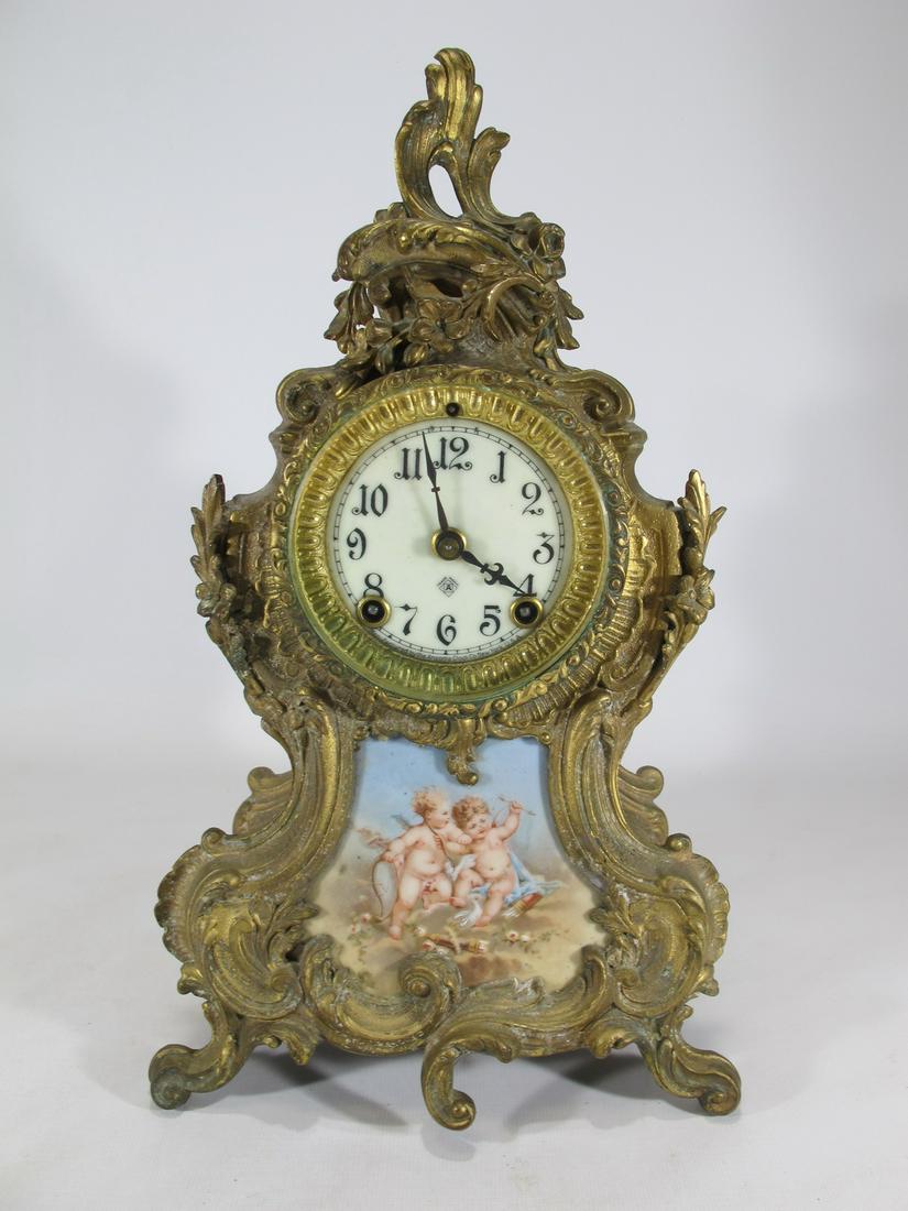Vintage Ansonia gilt spelter & porcelain mantel clock: Vintage Ansonia gilt spelter & porcelain mantel clock. 14 5/8” H x 8 1/4” W x 5 3/8” D. Shipping in USA or International please contact for quote both UPS stores: 1) : David Reiser U