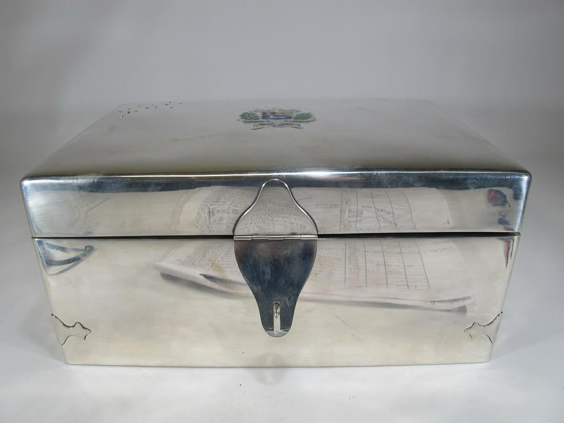 Large and rare Cartier sterling silve cigar box: Large and rare Cartier sterling silve cigar box with the venezuelan goverment shield celebrating the Independence on 1854. Total weight: 3202 grams (including inside wood). 5 1/2” H x 12”