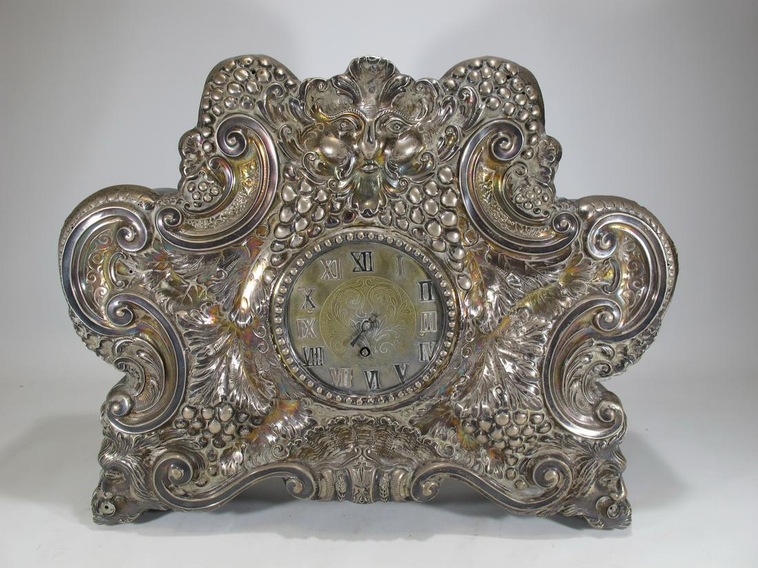 Antique probably from Spain silver & wood clock: Antique probably from Spain silver & wood clock. 15” H x 18 5/8” W x 3 5/8” D. Shipping in USA or International please contact for quote both UPS stores: 1) : David Reiser UPS store 