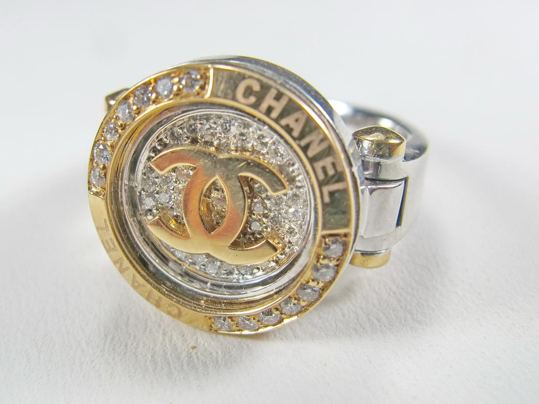Chanel imitation 18k yellow/white gold & diamonds ring: Chanel imitation 18k yellow/white gold & diamonds ring in a box. Weight: 11.4 grams (0t oz 7.330370 dwt).WE WILL ONLY ACCEPT WIRE TRANSFER OR CHECKS FOR THIS LOT, DO NOT BID IF YOU CAN NOT PAY USING T