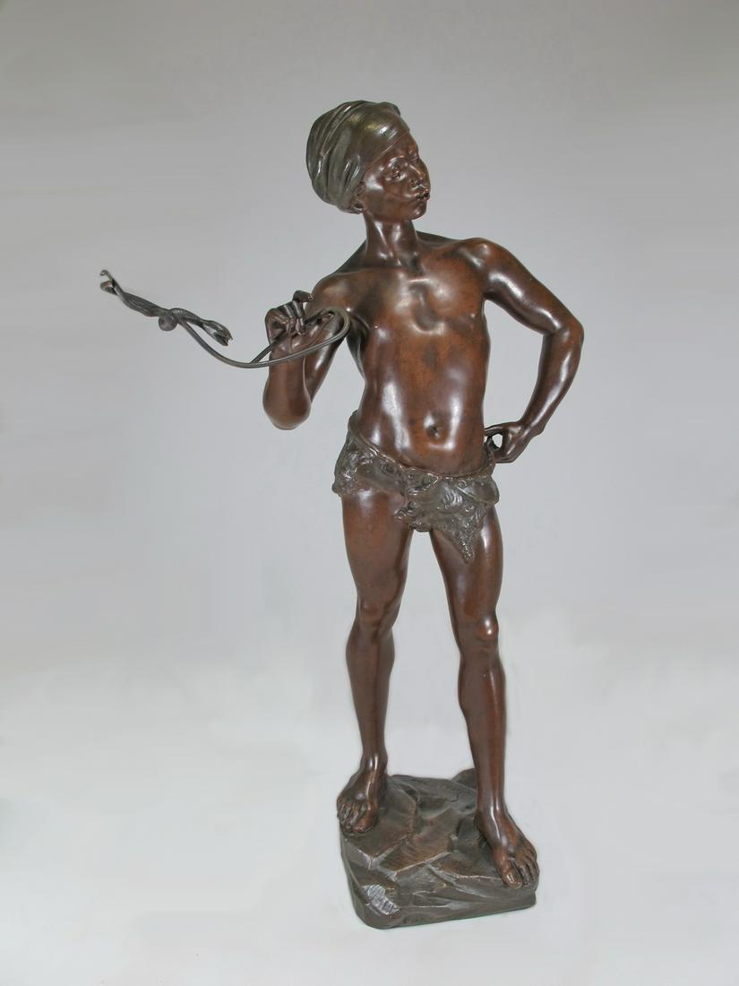 Adolphe Jean LAVERGNE (act.1863-1928) Orientalist: Adolphe Jean LAVERGNE (act.1863-1928) Orientalist bronze sculpture of a boy, signed. 21 in H x 8 3/4 in W x 5 1/2 in D not included the wire. 11 3/4 in W x 9 in D including the wire. Shipping in USA o