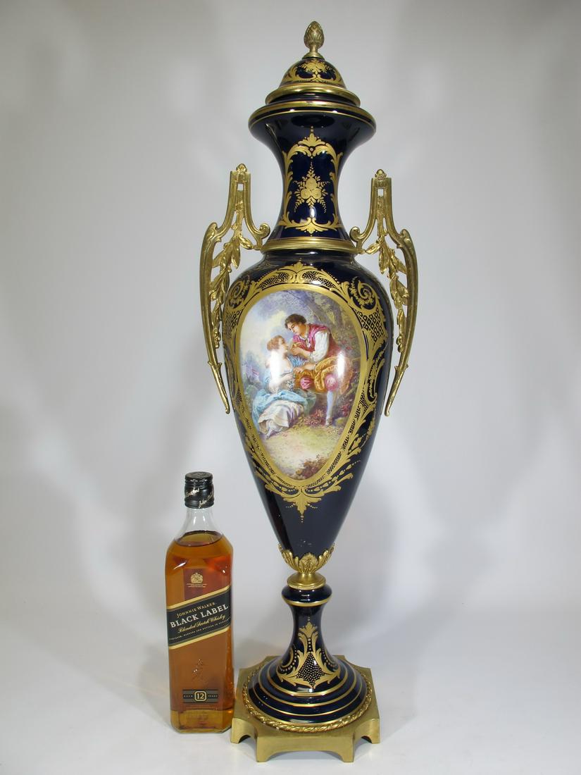 Antique French Sevres bronze & porcelain urn: Antique French Sevres bronze & porcelain urn. 29 1/2” H x 8 1/2” W x 6 1/4” D. Shipping in USA or International please contact for quote both UPS stores: 1) : David Reiser UPS store 
