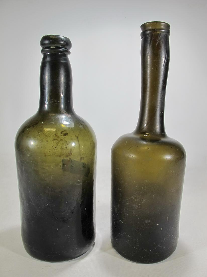 Antique English pair of dark glass bottles (1 of 6)