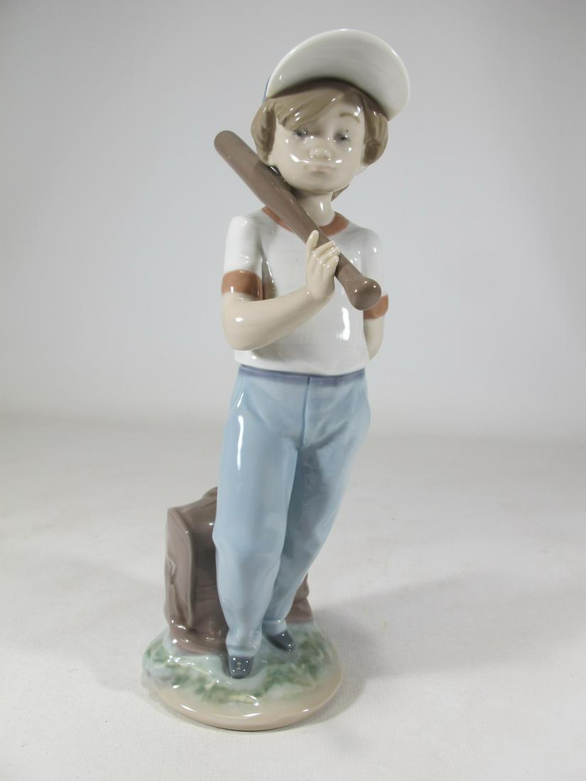 Lladro 7610 Can I Play? porcelain statue: Lladro 7610 Can I Play? porcelain statue, Designer: Antonio Ramos and with the original box. 8 1/4” H x 2 3/4” W x 3 1/4” D. Box: 5” H x 11” W x 5 3/4” D. Shipping 
