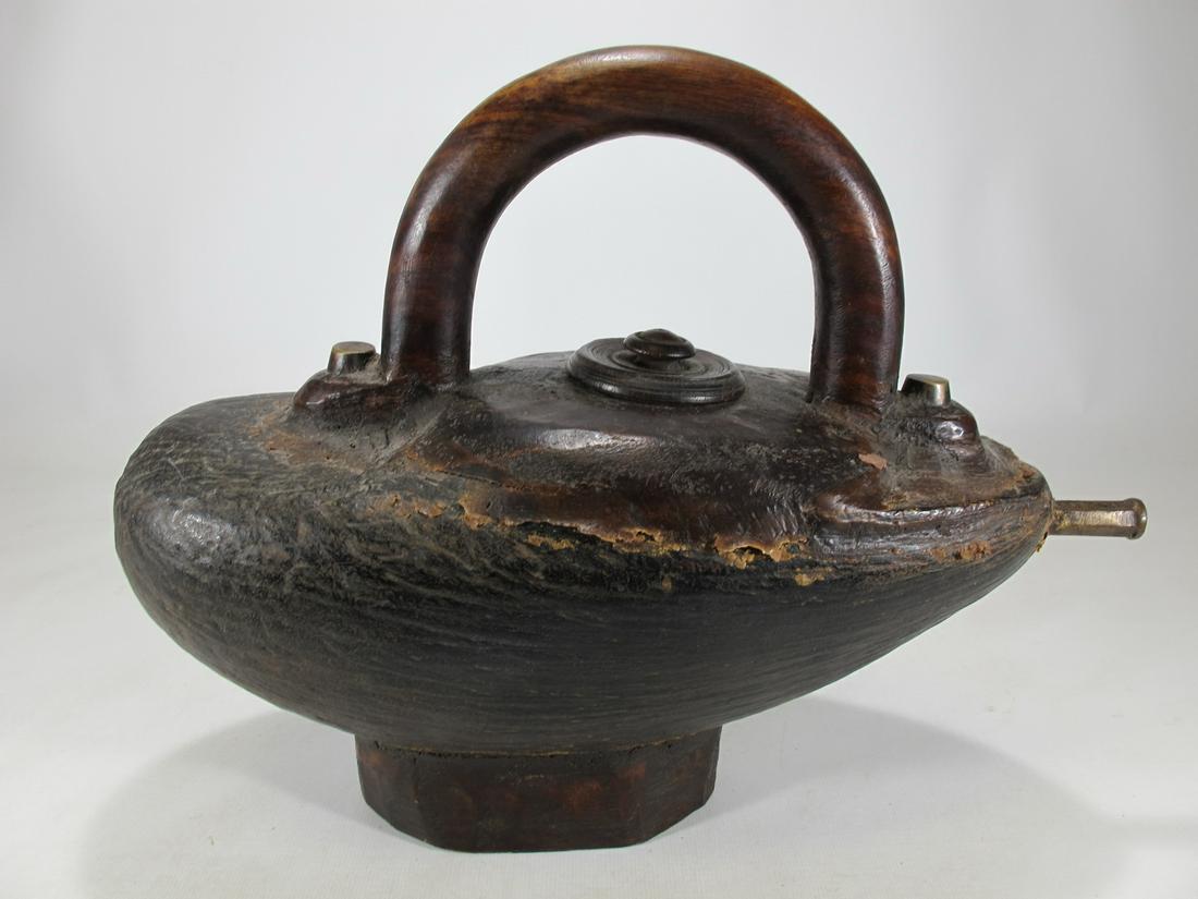 18th/19th C Oriental carved wood kettle: 18th/19th C Oriental carved wood kettle. 10 1/4” H x 12 3/4” W x 5 1/2” D. Shipping in USA or International please contact for quote both UPS stores: 1) : David Reiser UPS store 1937
