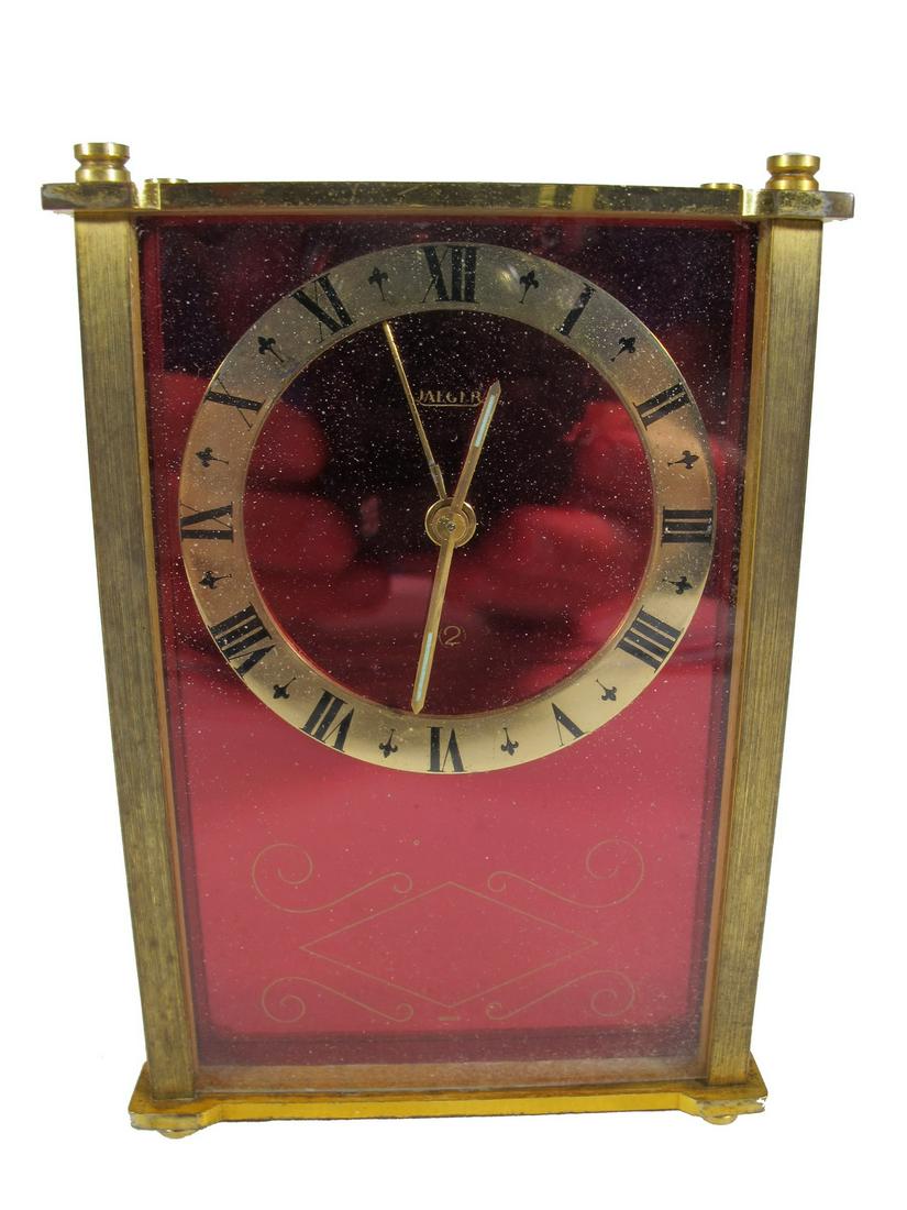 Jaeger LeCoultre alarm clock: Jaeger LeCoultre alarm clock. 5 1/8” H x 3 1/2” W x 1 5/8” D. ANY INVOICE OVER $ 2,000.00 WE WILL ACCEPT PAYMENTS ONLY THROUGH CHECK OR BANK WIRE TRANSFER, SAME FOR INTERNATIONAL BUY