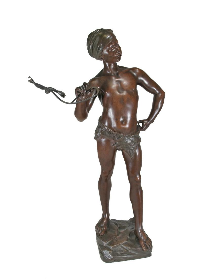 Adolphe Jean LAVERGNE (act.1863-1928) Orientalist: Adolphe Jean LAVERGNE (act.1863-1928) Orientalist bronze sculpture of a boy, signed. 21 in H x 8 3/4 in W x 5 1/2 in D not included the wire. 11 3/4 in W x 9 in D including the wire. ANY INVOICE OVER