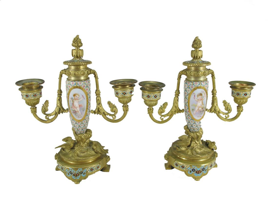 Antique pair of bronze champleve & porcelain: Antique pair of bronze champleve & porcelain candellabras. 7 5/8” H x 6 1/4” W x 2 7/8” D. ANY INVOICE OVER $ 2,000.00 WE WILL ACCEPT PAYMENTS ONLY THROUGH CHECK OR BANK WIRE TRANSFE