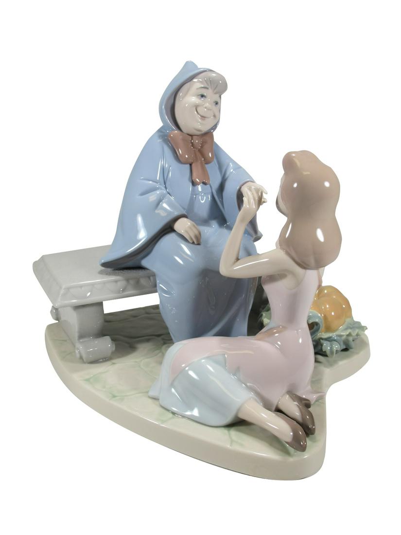 Lladro 7553 Cinderella & Failry Godmother porcelain: Lladro 7553 Cinderella & Failry Godmother porcelain statue, by Francisco Polope and with the original box. 8 1/2” H x 8 3/8” W x 9” D. Box: 11” H x 13” W x 11” D. A