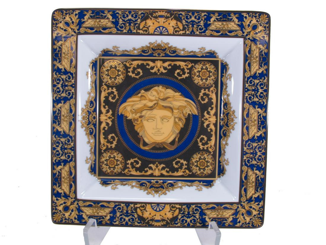 Rosenthal Versace Medusa Blue porcelain plate: Rosenthal Versace Medusa Blue porcelain plate. 1 1/4” H x 8 1/2” W x 8 1/2” D. ANY INVOICE OVER $ 2,000.00 WE WILL ACCEPT PAYMENTS ONLY THROUGH CHECK OR BANK WIRE TRANSFER, SAME FOR