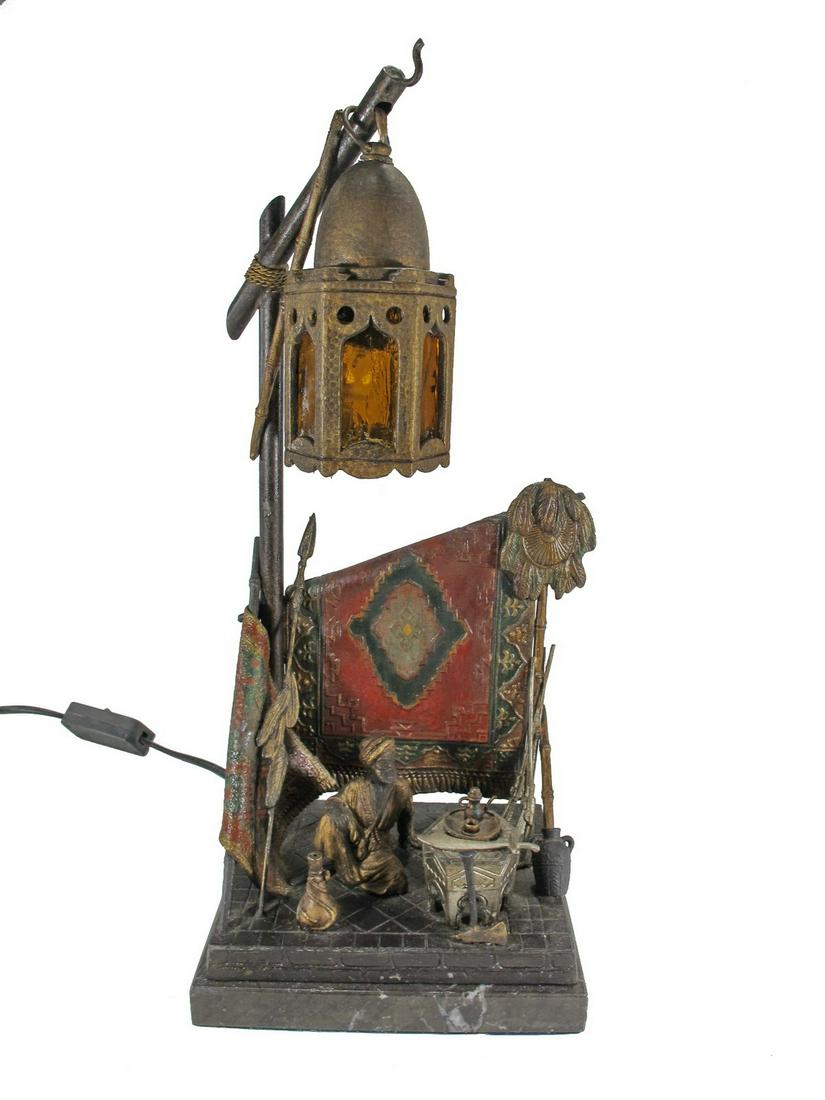 Antique Vienna bronze Orientalist spelter lamp: Antique Vienna bronze Orientalist spelter lamp. 15 1/2” H x 6 7/8” W x 5 1/8” D. ANY INVOICE OVER $ 2,000.00 WE WILL ACCEPT PAYMENTS ONLY THROUGH CHECK OR BANK WIRE TRANSFER, SAME FO