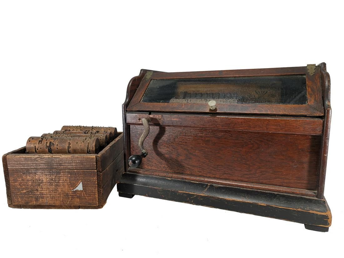 19th C Chautauqua roller organ & 14 extra cobs: 19th C Chautauqua roller organ & 14 extra cobs . 12 3/8” H x 17” W x 14” D. Extra cobs box: 5” H x 12” W x 8 1/2” D. ANY INVOICE OVER $ 2,000.00 WE WILL ACCEPT PAYM