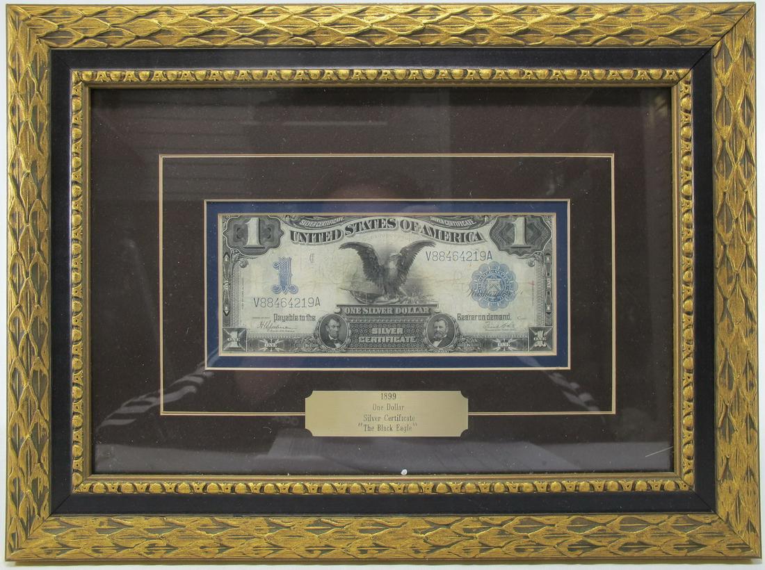 1899 $1 Silver Certificate Black Eagle Bill: 1899 $1 Silver Certificate Black Eagle Bill. 11 3/4” H x 16” W including frame. ANY INVOICE OVER $ 2,000.00 WE WILL ACCEPT PAYMENTS ONLY THROUGH CHECK OR BANK WIRE TRANSFER, SAME FOR INTER