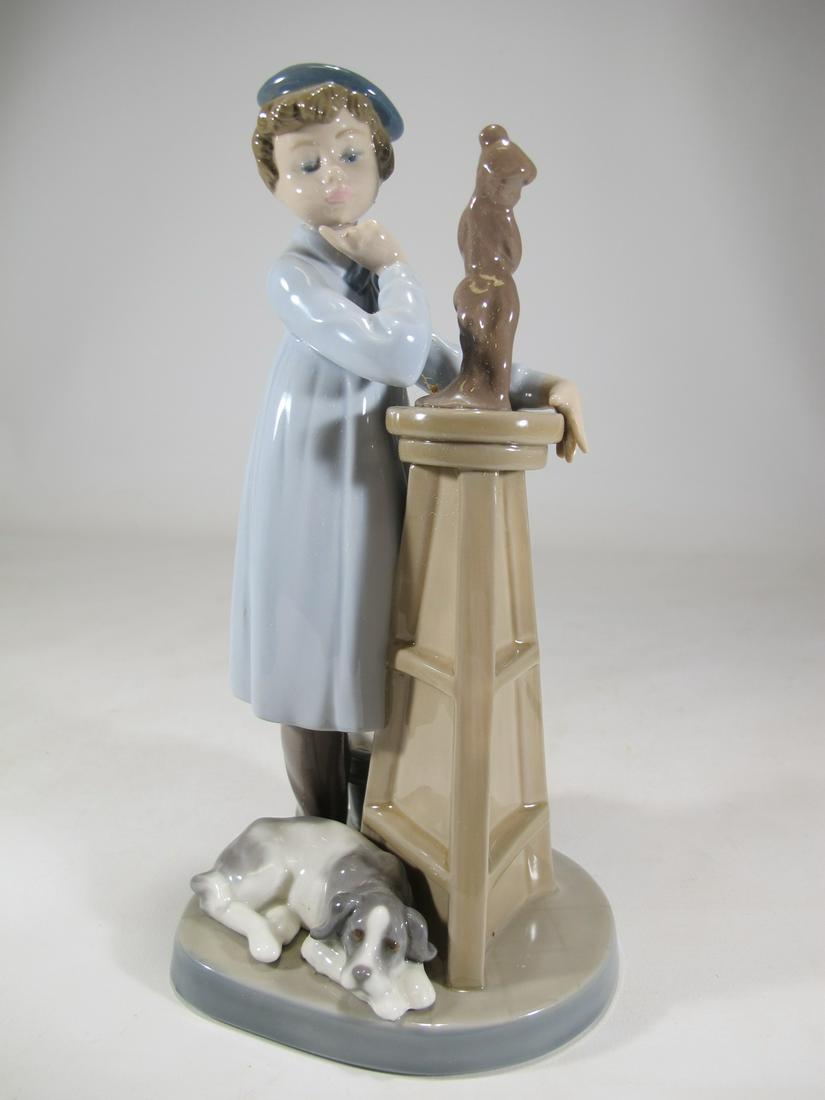 Lladro 5358 Little Sculptor porcelain statue: Lladro 5358 Little Sculptor porcelain statue, Sculptor is Antonio Ramos and with the original box. 8 3/8” H x 4 1/8” W x 3 3/4” D. Box: 4 7/8” H x 7 1/2” W x 10 3/4&rdquo