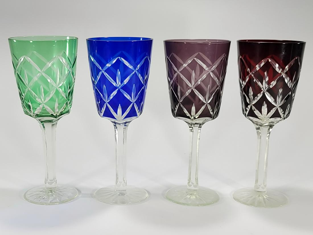 Set od 4 crystal colored glasses: Set od 4 crystal colored glasses. 9” H x 3 5/8” W. ANY INVOICE OVER $ 2,000.00 WE WILL ACCEPT PAYMENTS ONLY THROUGH CHECK OR BANK WIRE TRANSFER, SAME FOR INTERNATIONAL BUYERS. IF YOU PAY O