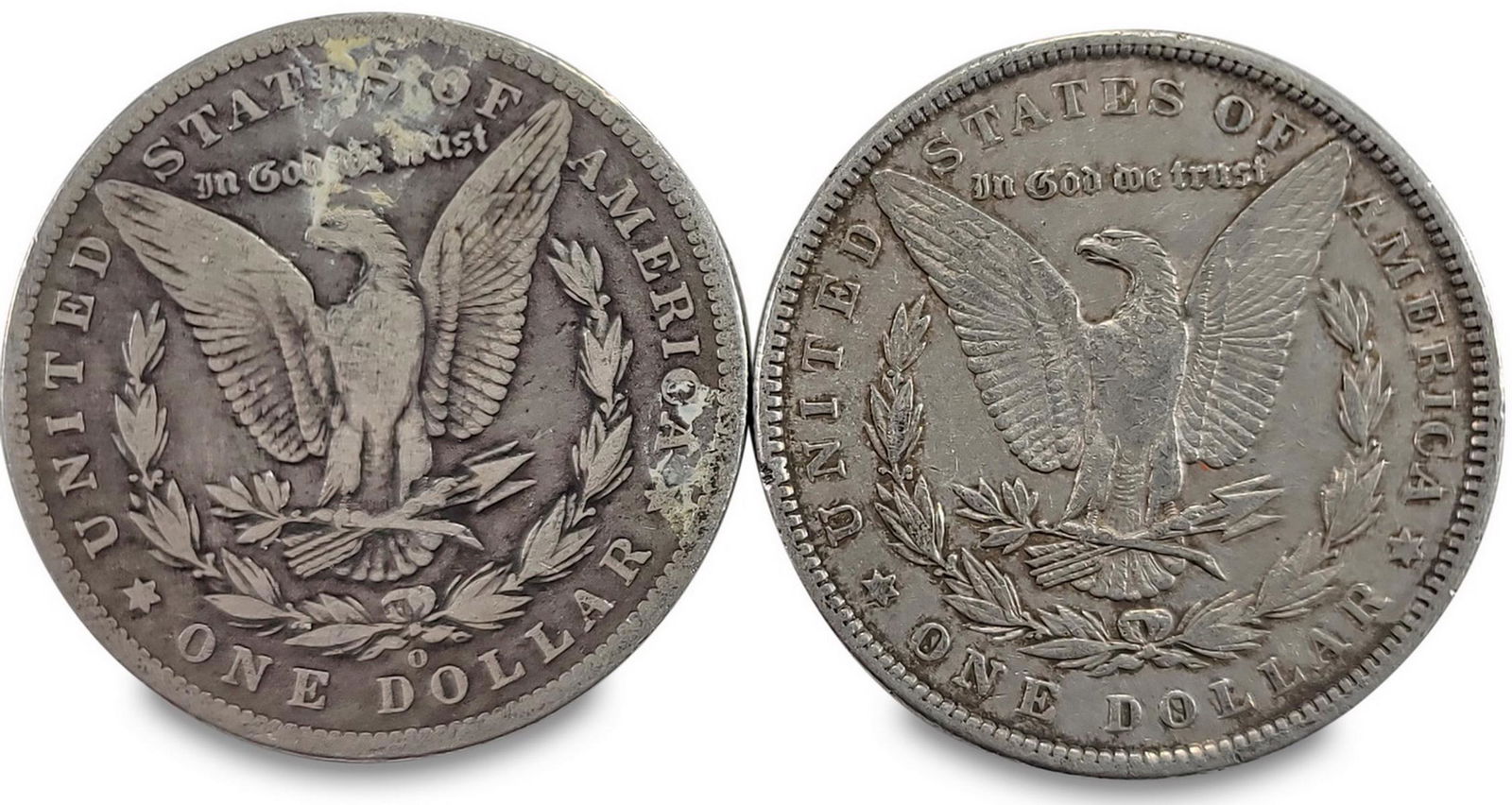 2 1886 Morgan silver dollar coins (1 of 2)