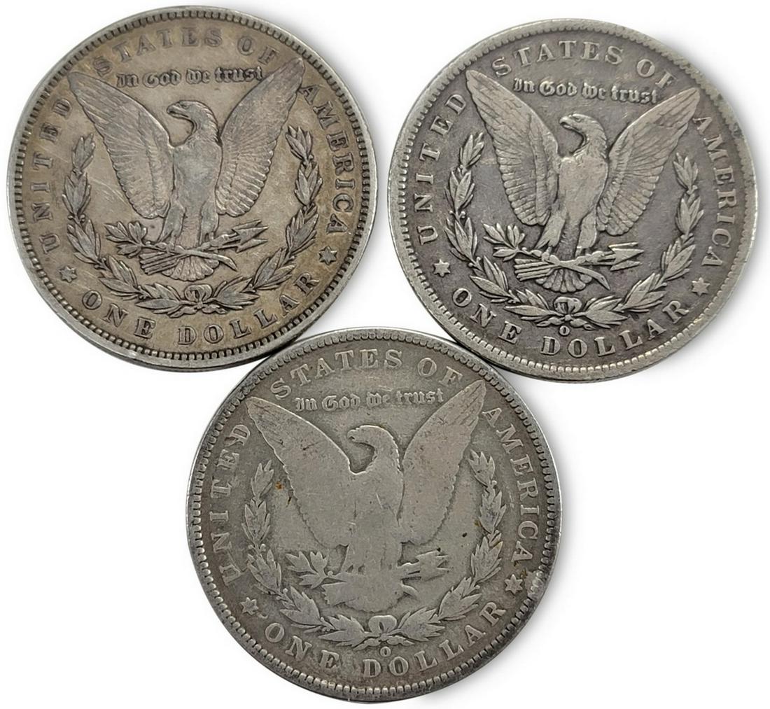 3 1890 Morgan silver dollar coins (1 of 2)