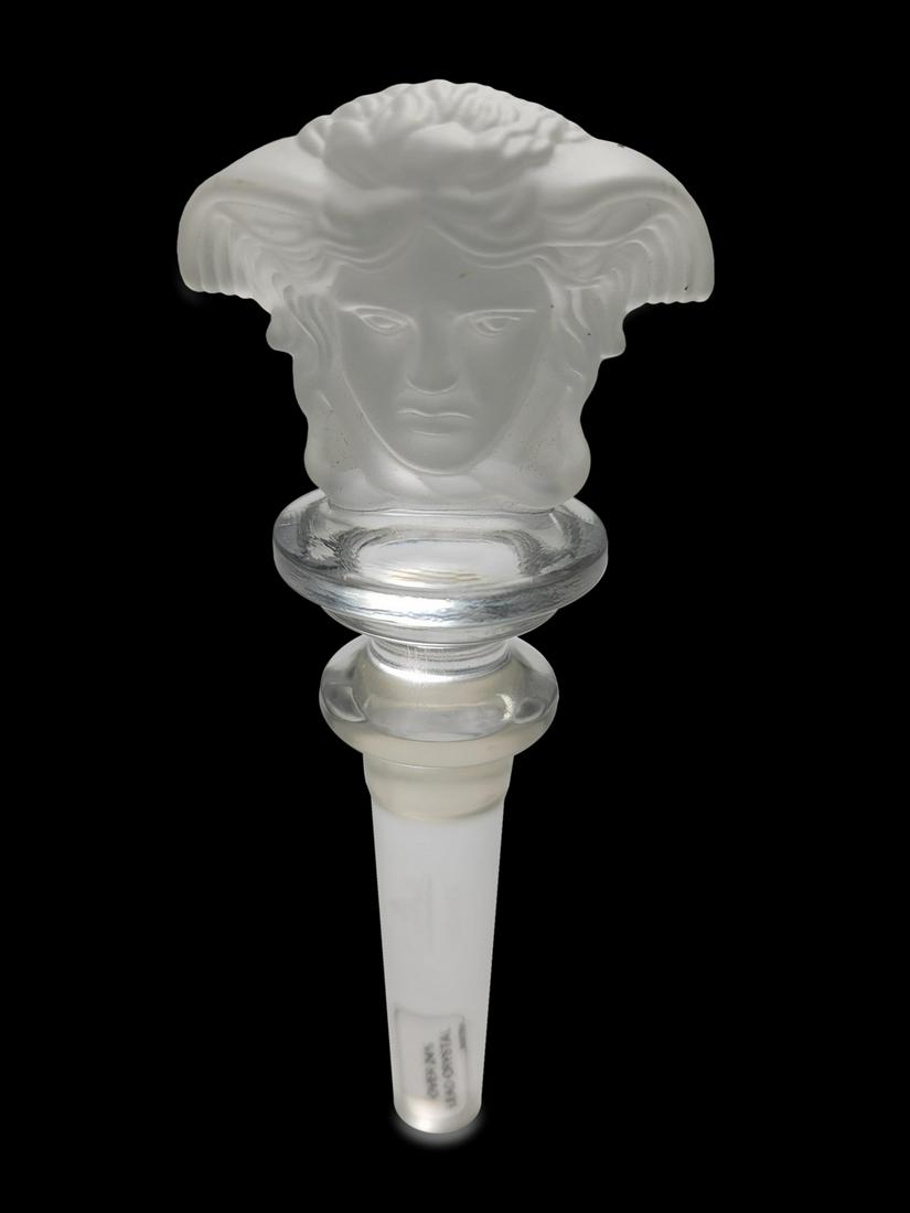 Versace, Medusa by Rosenthal crystal stopper: Versace, Medusa by Rosenthal crystal stopper. 5 1/8” H x 2” W x 1 1/2” D. ANY INVOICE OVER $ 2,000.00 WE WILL ACCEPT PAYMENTS ONLY THROUGH CHECK OR BANK WIRE TRANSFER, SAME FOR INTER