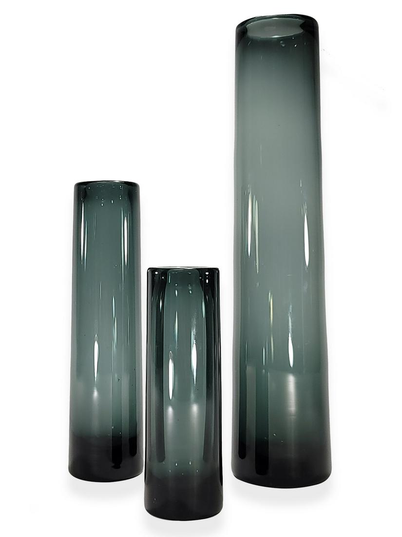 Holmegaard, Per Lutken, Denmark set of 3 glass vases: Holmegaard, Per Lutken, Denmark set of 3 glass vases. Bigger: 14 1/8” H x 3” W. ANY INVOICE OVER $ 2,000.00 WE WILL ACCEPT PAYMENTS ONLY THROUGH CHECK OR BANK WIRE TRANSFER, SAME FOR INTER