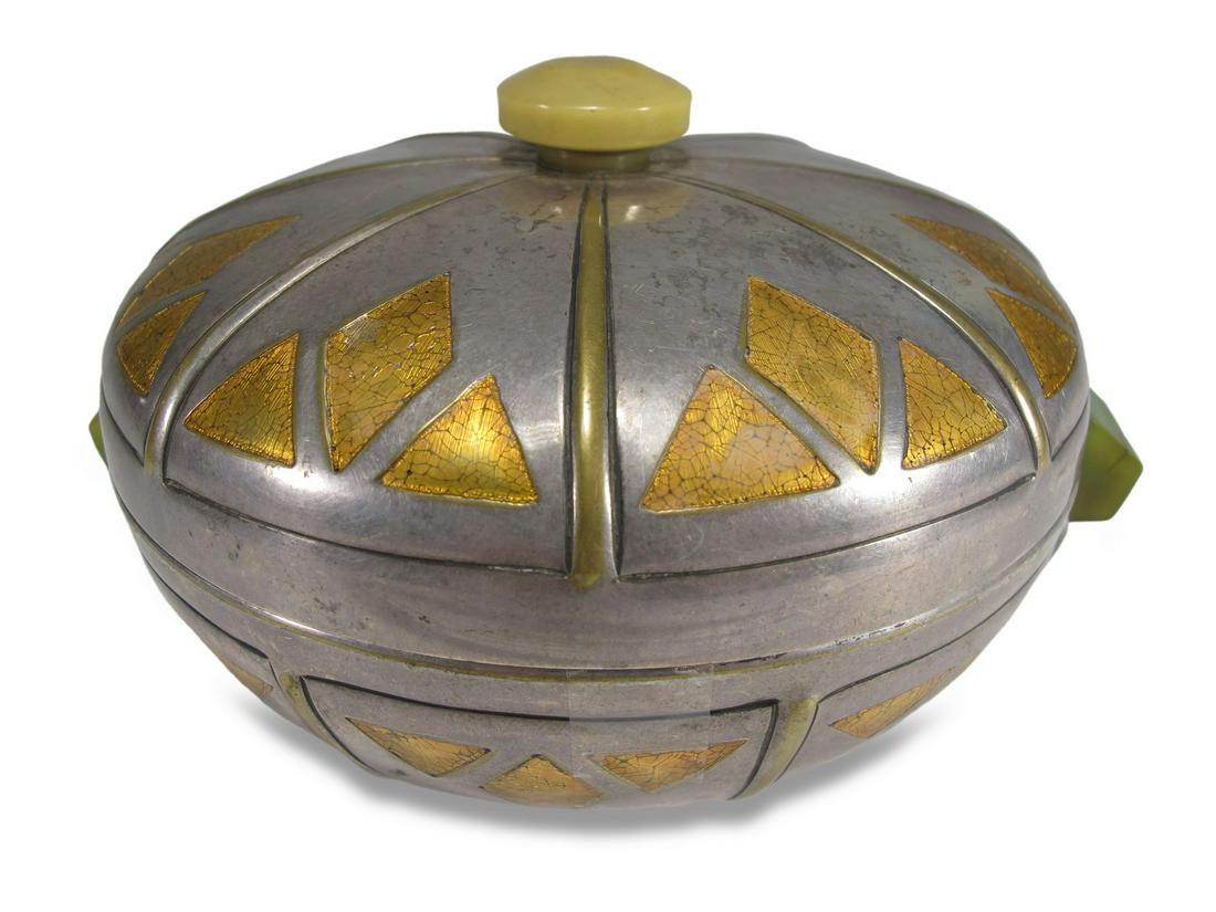 Art Deco silverplate & glass round box: Art Deco silverplate & glass round box with bakelite handles and lid. 2 7/8” H x 4 3/4” W. ANY INVOICE OVER $ 2,000.00 WE WILL ACCEPT PAYMENTS ONLY THROUGH CHECK OR BANK WIRE TRANSFER, SAM