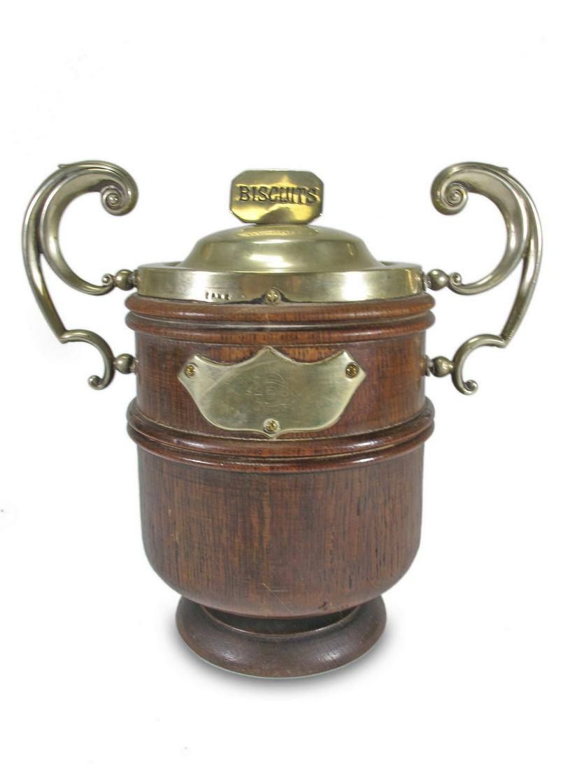 Vintage EPNS wood & bronze Biscuits Jar: Vintage EPNS wood & bronze Biscuits Jar. 9” H x 9 5/8” W x 5 3/8” D. ANY INVOICE OVER $ 2,000.00 WE WILL ACCEPT PAYMENTS ONLY THROUGH CHECK OR BANK WIRE TRANSFER, SAME FOR INTERNATIO