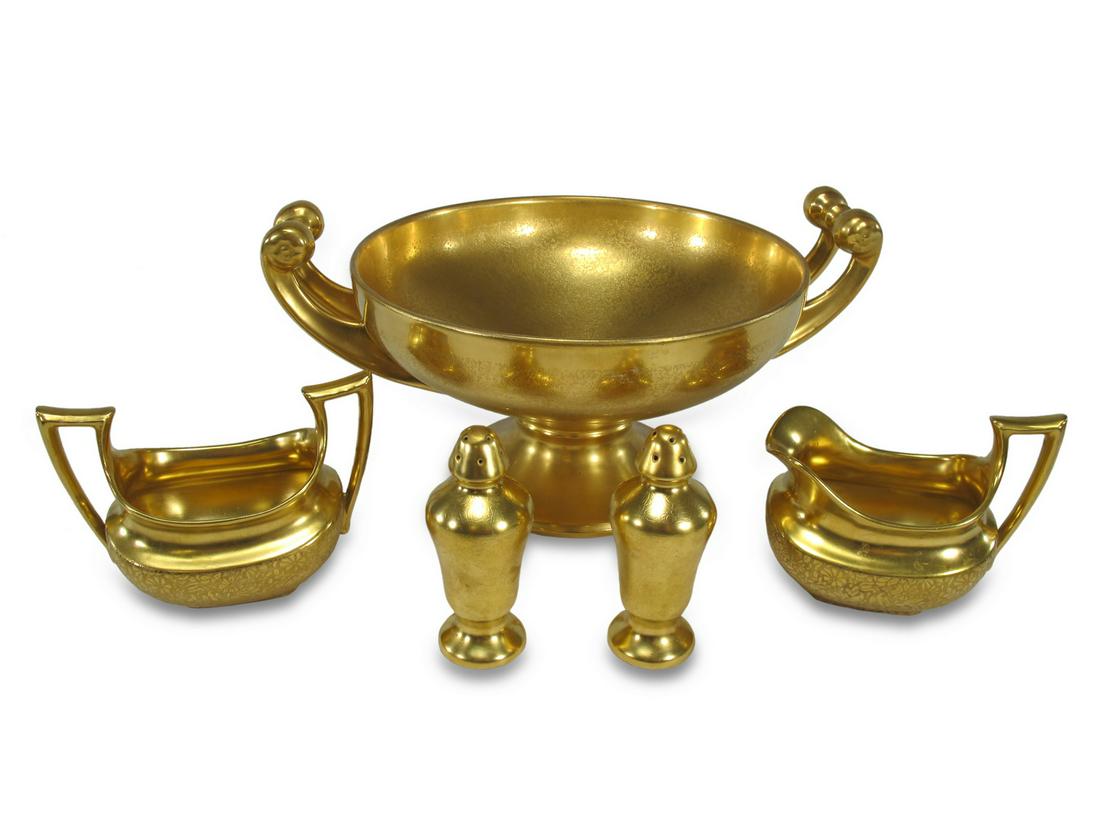 Hutschenreuther gilt porcelain set: Hutschenreuther gilt porcelain set. Bowl: 5 7/8 H x 11 1/4 W x 8 3/8 D. Sugarpot: 3 1/2 H x 4 1/2 W x 3 D. ANY INVOICE OVER $ 2,000.00 WE WILL ACCEPT PAYMENTS ONLY THROUGH CHECK OR BANK WIRE TRANSFER,