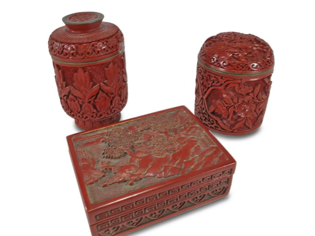 Chinese cinnabar box & 2 jars: Chinese cinnabar box & 2 jars. Box: 1 5/8 H x 4 1/2 W x 3 3/8 D. Jar: 3 5/8 H x 3 1/4 W. Jar: 4 3/4 H x 2 3/8 W. ANY INVOICE OVER $ 2,000.00 WE WILL ACCEPT PAYMENTS ONLY THROUGH CHECK OR BANK WIRE TRA