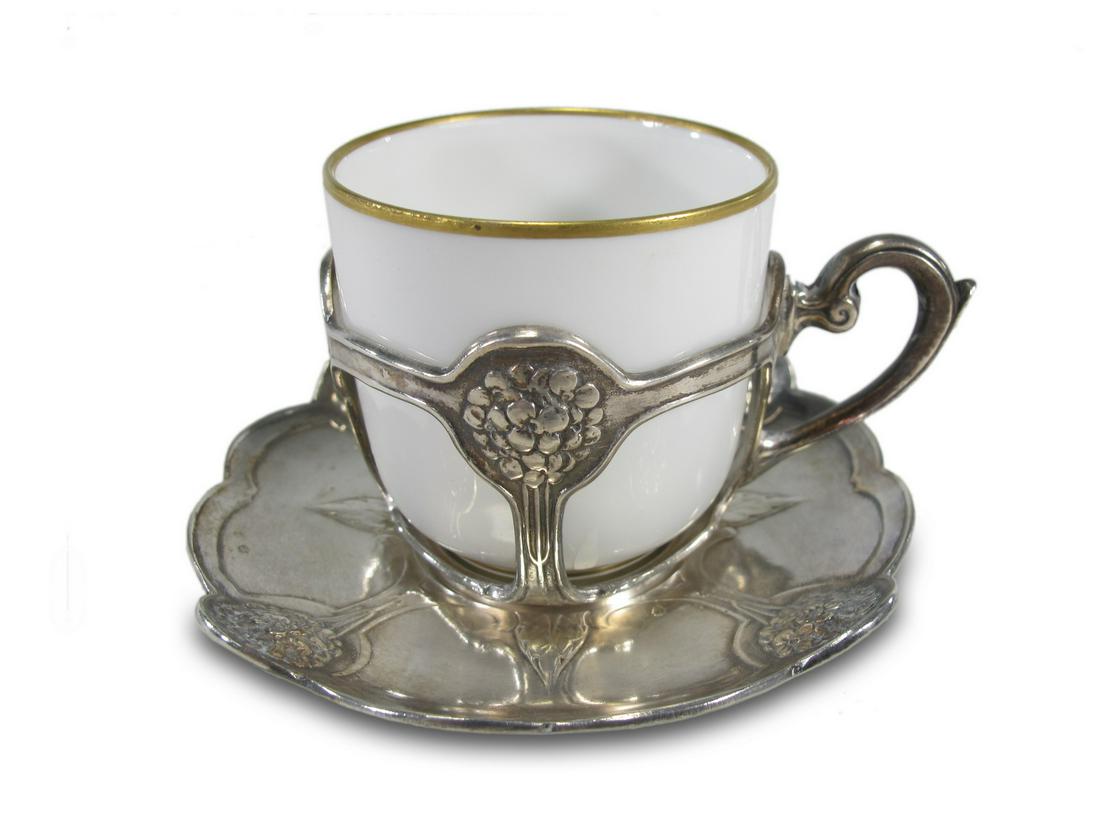 Christofle Gallia metal & porcelain cup: Christofle Gallia metal & porcelain cup. Cup: 2 1/8 H x 2 W. Plate: 3 3/4 W. ANY INVOICE OVER $ 2,000.00 WE WILL ACCEPT PAYMENTS ONLY THROUGH CHECK OR BANK WIRE TRANSFER, SAME FOR INTERNATIONAL BUYERS