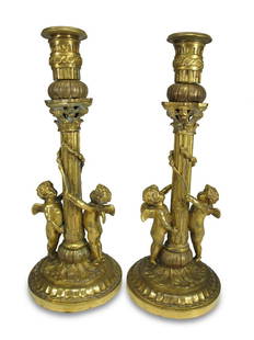 Antique French pair of bronze candlesticks: Antique French pair of bronze candlesticks. 7 1/8 H x 3 1/2 W x 2 7/8 D. ANY INVOICE OVER $ 2,000.00 WE WILL ACCEPT PAYMENTS ONLY THROUGH CHECK OR BANK WIRE TRANSFER, SAME FOR INTERNATIONAL BUYERS.