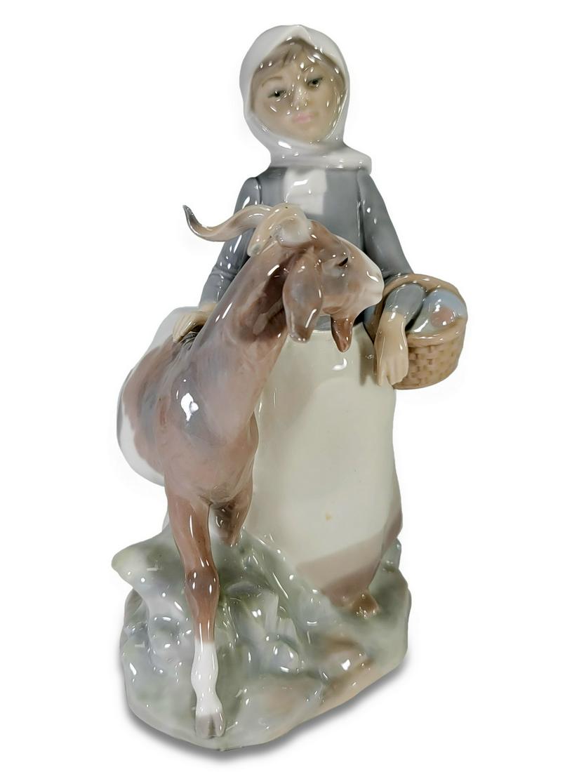 Lladro Little Girl with Goat by Fulgencio Garcia: Lladro Little Girl with Goat by Fulgencio Garcia. 8 1/8 H x 5 W x 5 5/8 D. TO SHIP THIS ITEM IN USA OR INTERNATIONAL, PLEASE CONTACT THE SHIPPERS : 1) UPS store1937- David Reiser -754-263-0780, auctio