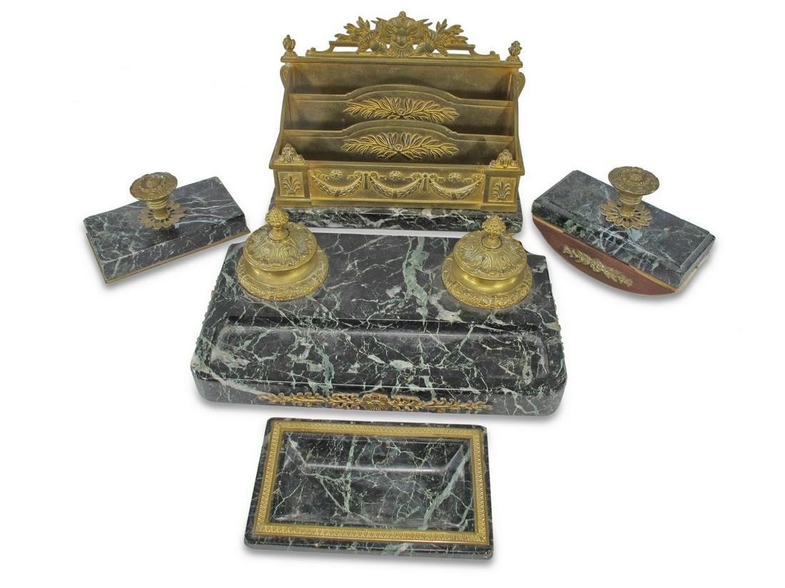 Antique French bronze & marble desk set: Antique French bronze & marble desk set. Inkwell: 4 1/4 H x 7 W x 4 1/4 D. Letter stand: 7 H x 9 3/4 W x 5 3/8 D. Blotter: 4 H x 6 W x 2 7/8 D. Paperweight: 2 5/8 H x 5 1/2 W x 3 1/4 D. Ashtray: 1 3/8
