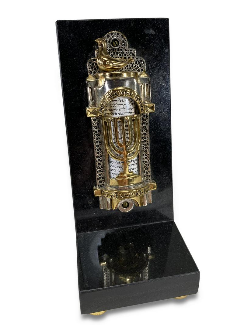 Frank Meisler Mezuzah, mounted on marble: Frank Meisler Mezuzah, mounted on marble. 6 5/8 H x 3 W x 4 D. TO SHIP THIS ITEM IN USA OR INTERNATIONAL, PLEASE CONTACT THE SHIPPERS : 1) UPS store1937- David Reiser -754-263-0780, auctions1937@gmail