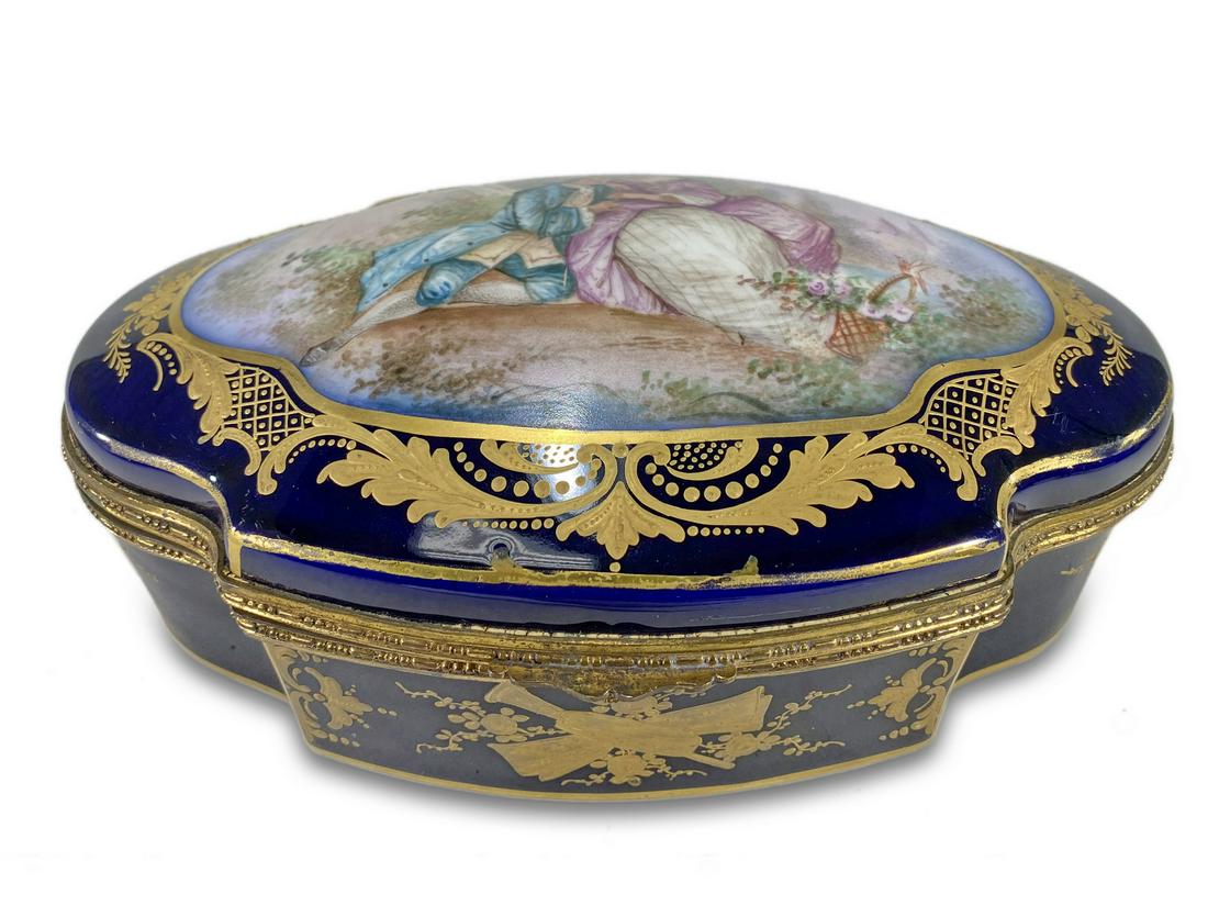 Antique French Sevres porcelain box: Antique French Sevres porcelain box. 3 H x 9 3/4 W x 6 3/8 D. TO SHIP THIS ITEM IN USA OR INTERNATIONAL, PLEASE CONTACT THE SHIPPERS : 1) UPS store1937- David Reiser -754-263-0780, auctions1937@gmail.