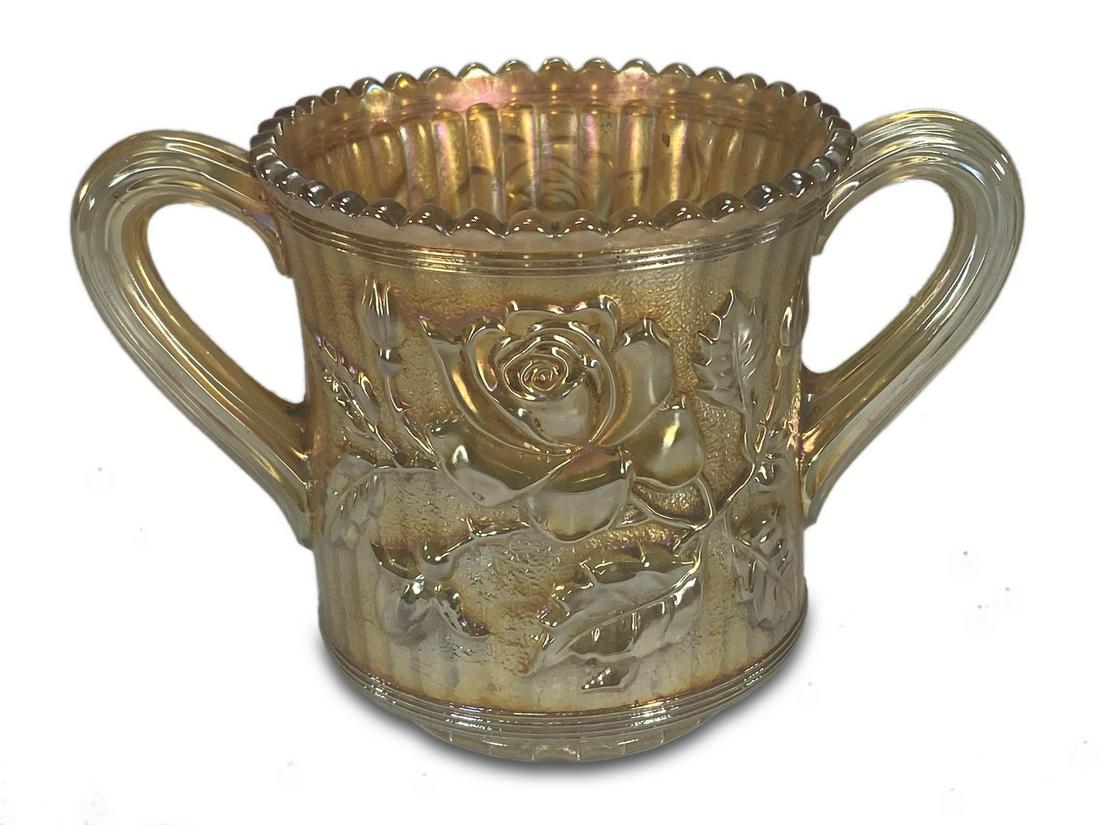 Old iridescent glass cup: Old iridescent glass cup. 4 1/8 H x 6 1/2 W x 4 D. TO SHIP THIS ITEM IN USA OR INTERNATIONAL, PLEASE CONTACT THE SHIPPERS : 1) UPS store1937- David Reiser -754-263-0780, auctions1937@gmail.com, 2) Pak