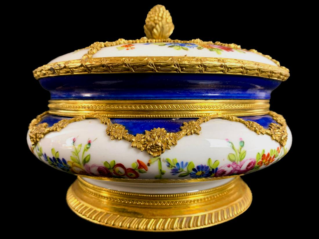 Antique French Sevres porcelain & bronze Bombonniere: Antique French Sevres porcelain & bronze Bombonniere. 5 1/4 H x 6 7/8 W. TO SHIP THIS ITEM IN USA OR INTERNATIONAL, PLEASE CONTACT THE SHIPPERS : 1) UPS store1937- David Reiser -754-263-0780, auctions