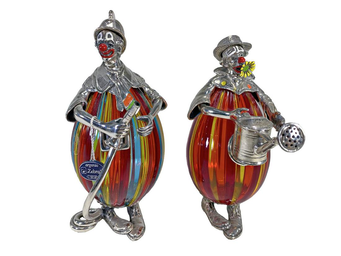 Vittorio Angini pair of Murano & 800 Silver Clowns: Vittorio Angini pair of Murano & 800 Silver Clowns. 6 5/8 x 3 1/8 and 5 7/8 x 2 1/2 x 4 5/8 inTO SHIP THIS ITEM IN USA OR INTERNATIONAL, PLEASE CONTACT THE SHIPPERS : 1) UPS store1937- David Reiser -7