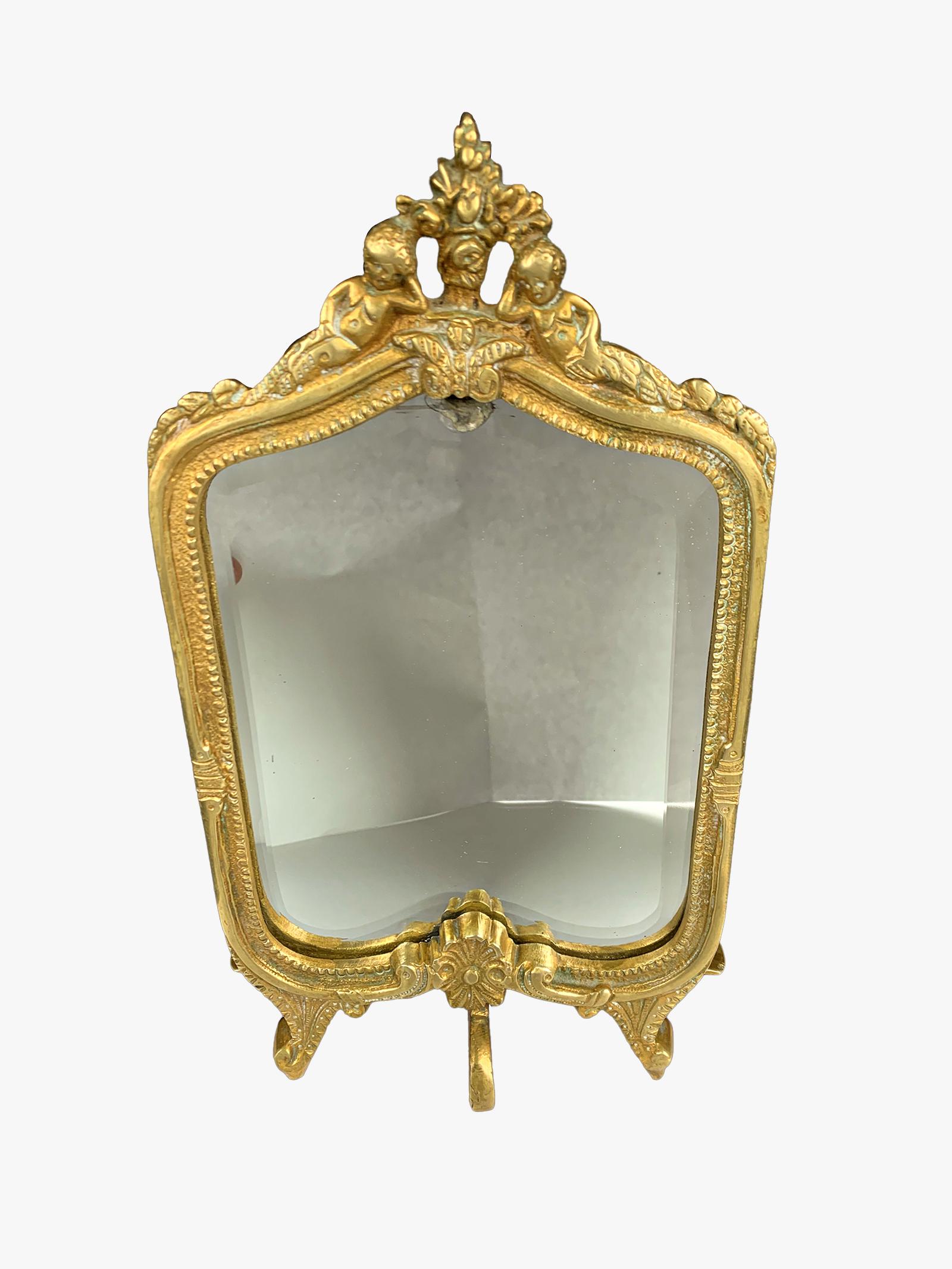 Antique French bronze & bevelled glass mirror: Antique French bronze & bevelled glass mirror. 10 1/4 x 5 1/2 x 4 in. TO SHIP THIS ITEM IN USA OR INTERNATIONAL, PLEASE CONTACT THE SHIPPERS : 1) UPS store1937- David Reiser -754-263-0780, auctions193