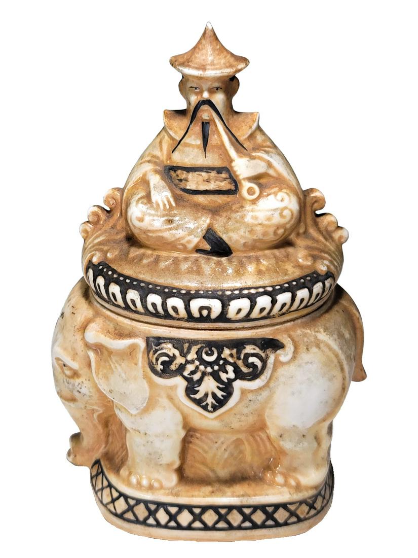 Goebel, Germany Elephant & Man Porcelain Box: Goebel, Germany Elephant & Man Porcelain Box. 6 1/4 x 4 x 3 in. TO SHIP THIS ITEM IN USA OR INTERNATIONAL, PLEASE CONTACT THE SHIPPERS : 1) UPS store1937- David Reiser -754-263-0780, auctions1937@gmai