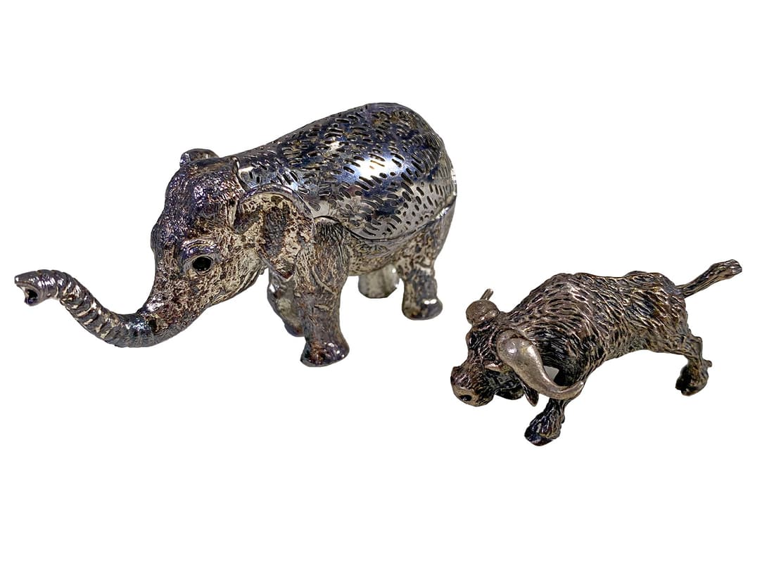 Christofle Elephant & 800 Silver Bull: Christofle Elephant & 800 Silver Bull. 1 1/2 x 2 7/8 x 7/8 in and 1 x 1 3/4 x 1 1/8 in.Local Pick up call one day before to make an appointment. TO SHIP THIS ITEM IN USA OR INTERNATIONAL, PLEASE CONTA