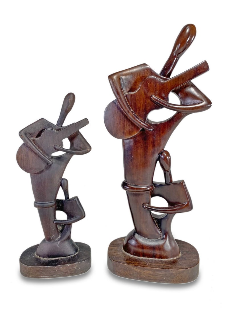 2 Fig playing guitar wood sculptures: 2 Fig playing guitar wood sculptures. 12 1/2 x 5 1/4 x 3 1/8 in and 9 1/2 x 3 3/4 x 2 1/4 in. Local Pick up call one day before to make an appointment. TO SHIP THIS ITEM IN USA OR INTERNATIONAL, PLEAS